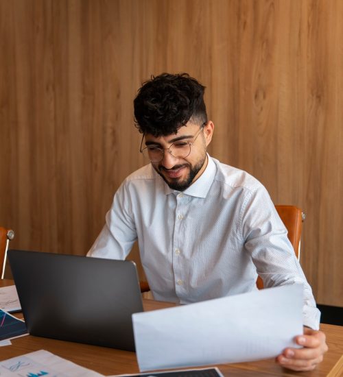 office-worker-using-finance-graphs_23-2150408676